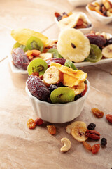 Dried tropical fruits with various nuts and raisins.
