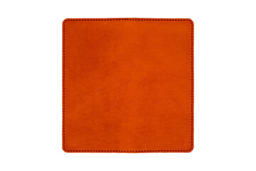 Orange leather square with stitching edges, rounded corners and copyspace is isolated.