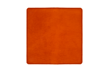 Orange leather square with stitching edges, rounded corners and copyspace is isolated.