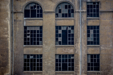 Broken windows of an old building