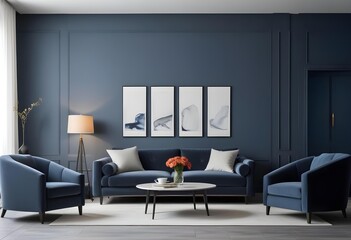 Fototapeta premium A modern living room with a gray sofa, armchairs, and a coffee table in front of a fireplace. The walls are painted in a dark blue color, and there are four framed artworks hanging on the wall.