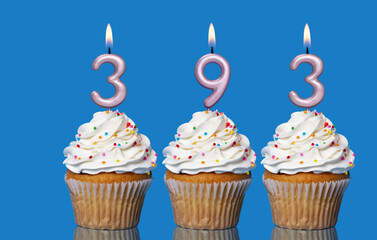 Birthday Cupcakes With Candles Lit Forming The Number 393
