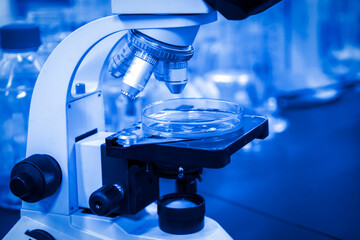 The research institute observes reagents under a microscope