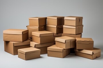 Fototapeta premium Set of brown cardboard mess boxes on grey background