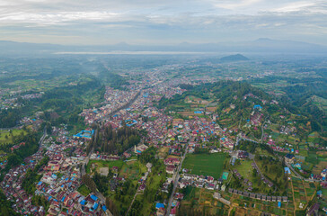 Aerial drone view of greenery countryside scenery in Berastagi, North Sumatra, Indonesia. 