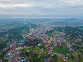 Aerial drone view of greenery countryside scenery in Berastagi, North Sumatra, Indonesia. 