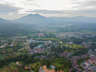 Aerial drone view of greenery countryside scenery in Berastagi, North Sumatra, Indonesia. 