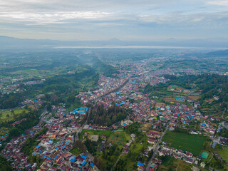 Aerial drone view of greenery countryside scenery in Berastagi, North Sumatra, Indonesia. 