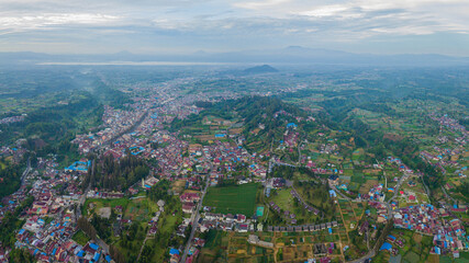 Aerial drone view of greenery countryside scenery in Berastagi, North Sumatra, Indonesia. 