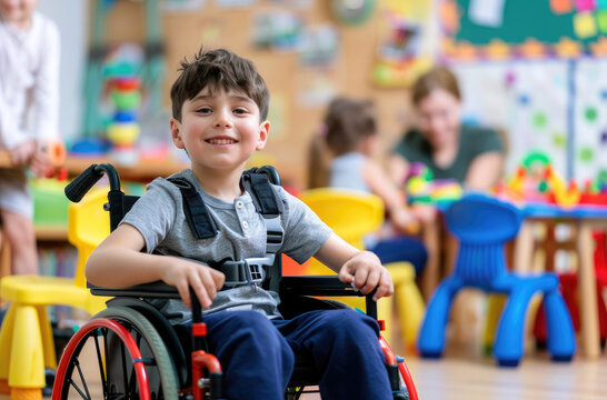 A happy child in their wheelchair playing with toys at the kindergarten, surrounded by other children and a teacher smiling nearby