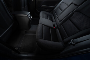 Clean car interior with soft dark mats