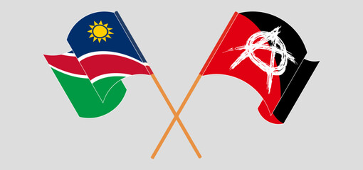 Crossed and waving flags of Namibia and Anarchy