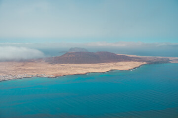 Canary Islands, the island of La Graciosa in a beautiful picture, photographed from above. Island in the ocean. Volcano photo