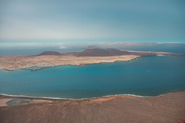 Canary Islands, the island of La Graciosa in a beautiful picture, photographed from above. Island in the ocean. Volcano photo
