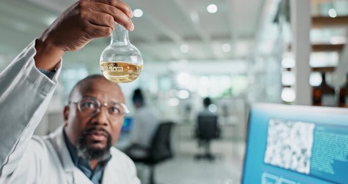 Black man, scientist and chemicals in beaker at lab for research experiment, test study and analyse results. African, researcher and yellow liquid for investigation, formula and pharmaceutical health