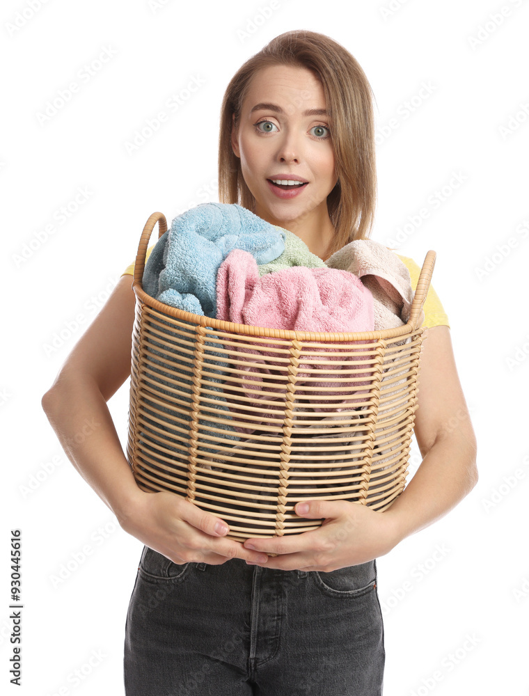 Canvas Prints Happy young housewife with basket full of laundry on white background