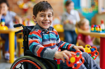 A happy child in their wheelchair playing with toys at the kindergarten, surrounded by other...