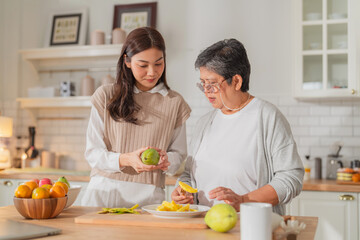 mother day family relation bonding at home asian family mother father and daughter enjoy cuddle conversation morning lifestyle hapiness joyful moment while stay at kitchen area home love bonding