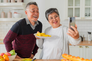 Asian marry couple old senior silver age lifestyle retired asia couple video calling or selfie...