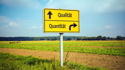 Obraz premium Signposts the direct way to quality versus quantity
