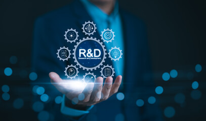 R&D, Research and Development Concept. A businessman holds out his hand, showcasing icons...