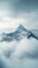 Snow-capped mountain peak rising above the
