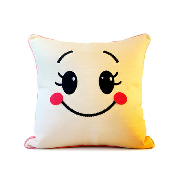 Una linda almohada con una carita muy feliz y encantadora