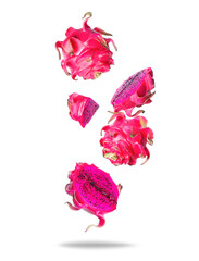 Sliced ripe dragon fruit in the air on a transparent background. Group of pitahayas are falling down