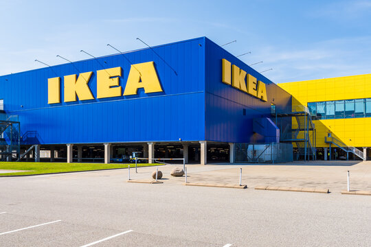 Malm&ouml;, Sweden - July 19, 2024: Large IKEA signs on the blue facade of the IKEA store, a swedish multinational company that markets flat-pack furniture.