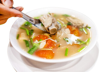 Top view of Thai Pork Ribs Spicy Soup, focus selective