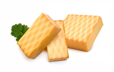 Cubes of cheddar cheese isolated on white