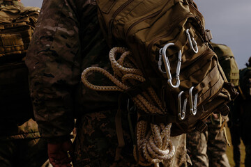 Tactical Backpack with Military Gear on Soldier's Back