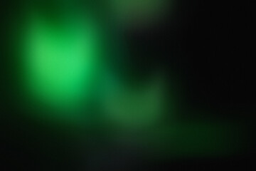 Green abstract light leak overlay background with a dusty texture. Grunge style film grain noise overlay light leak background. Green light blur overlay, leak flare, prism light effect.