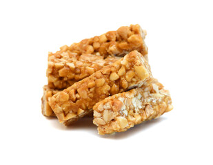 Honey bars with peanuts, sesame and sunflower seeds isolated
