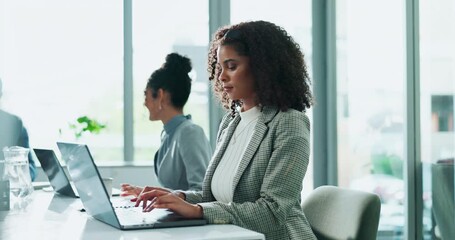 Businesswoman, laptop and typing in office or working on proposal, research on internet for company pitch. Female accountant, plan or computer for budget strategy, financial report or economy website - Powered by Adobe