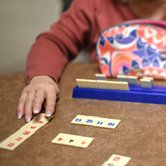 game games senior seniors tabletop card, hand, table, people, person, hands, casino, table, betting, chips, gambling