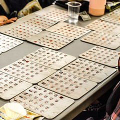 game games bingo senior seniors tabletop card, hand, table, people, person, hands, casino, table, betting, chips, gambling