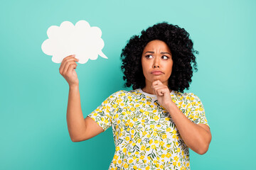 Photo of nice young woman think empty space bubble wear t-shirt isolated on teal color background