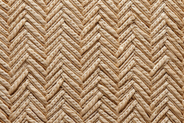 Detailed view of a woven hemp rug showcasing its intricate braided design.