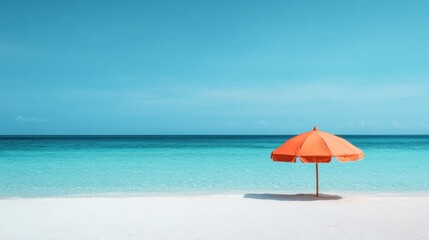 A lone orange beach umbrella stands on a pristine sandy beach under a clear blue sky, representing solitude, calmness, and relaxation in an idyllic seaside setting.