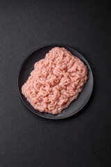 Fresh raw chicken mince with salt and spices