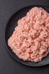 Fresh raw chicken mince with salt and spices
