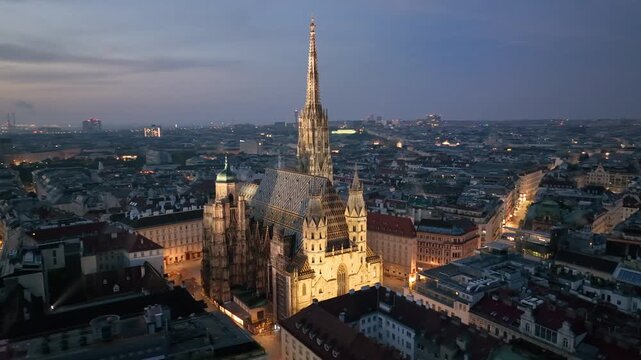 Aerial view of famous places St. Stephen's Cathedral (Stephansdom) at night. Mother church of the Roman Catholic Archdiocese of Vienna. Austria