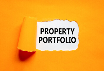 Property portfolio symbol. Concept words Property portfolio on beautiful white paper. Beautiful orange paper background. Business Property portfolio concept. Copy space.