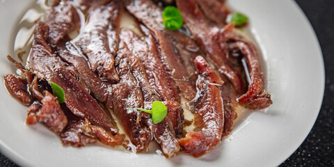 anchovies on the table canned fish in oil fresh and tasty seafood meal food snack on the table copy space food background rustic top view 