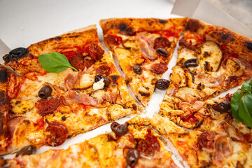 pizza chicken meat and olives, sausages, cheese, tomato sauce fresh meal food snack on the table copy space food background rustic top view