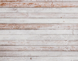 White wooden boards with a slightly weathered texture form the background, showcasing subtle grain patterns and a soft, worn patina that adds a touch of rustic charm and timeless appeal