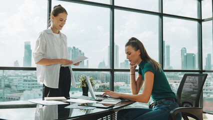 Smart businesswoman present start up project while executive manager listen carefully. Professional business team working together, sharing, discussing, thinking about business idea. Tracery