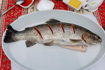 Preparing to cook baked fish