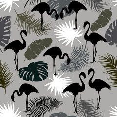 Contour illustration with flamingos.Black flamingos and palm leaves in a seamless pattern.
